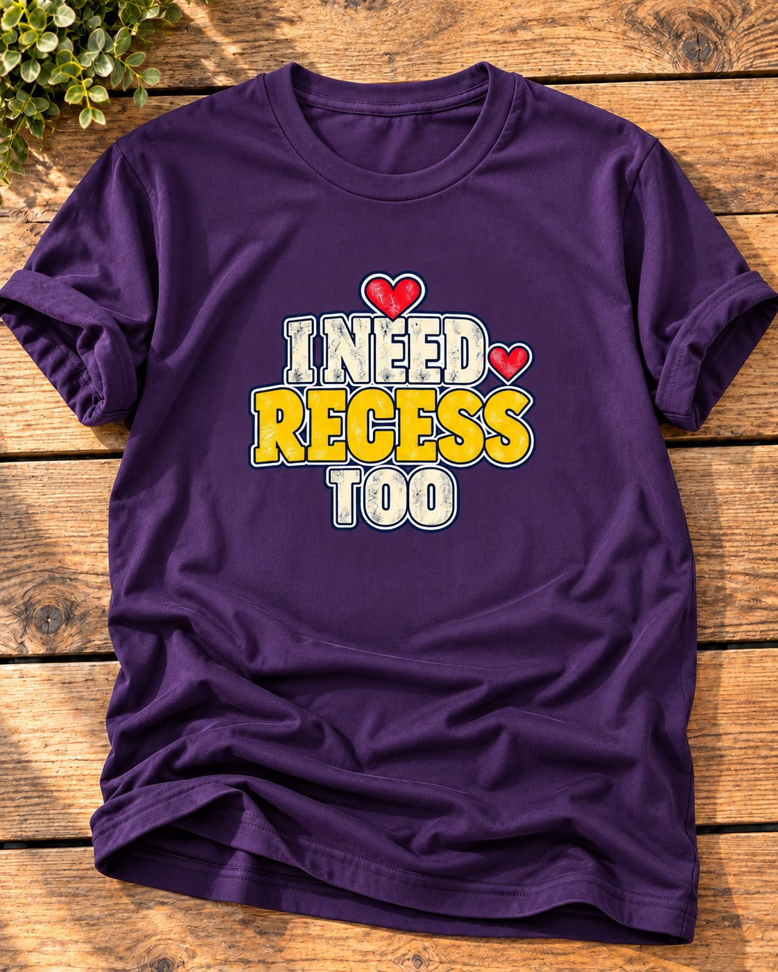 Purple "I Need Recess Too" mom t-shirt with cream and yellow varsity letters