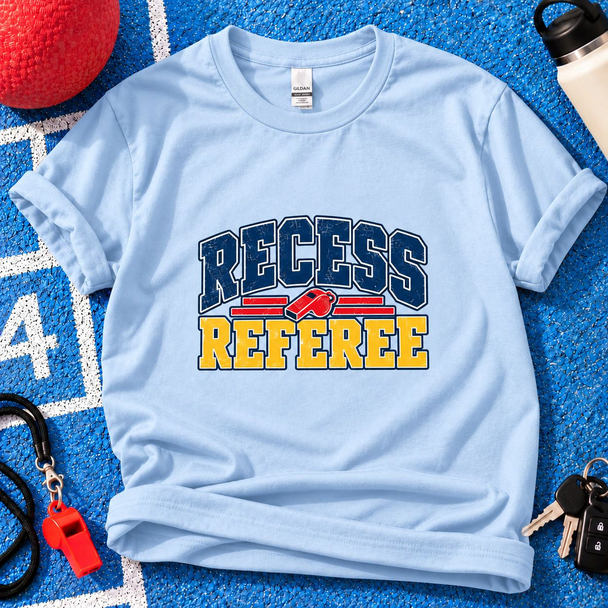 Recess Referee Parent T-Shirt in Light Blue on blue playground background