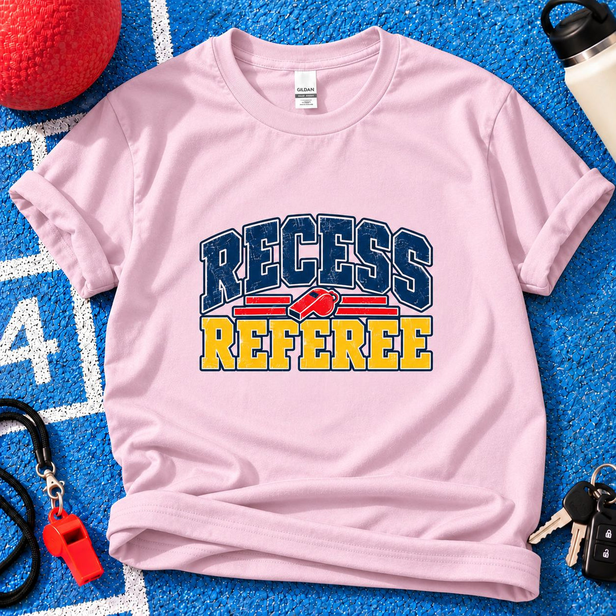 Recess Referee Parent T-Shirt in Light Pink on blue playground background